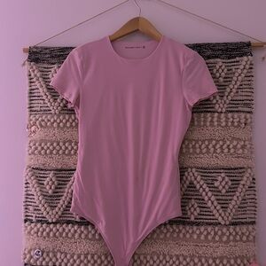pink body suit from abercrombie & fitch super cute hasn’t been worn yet
